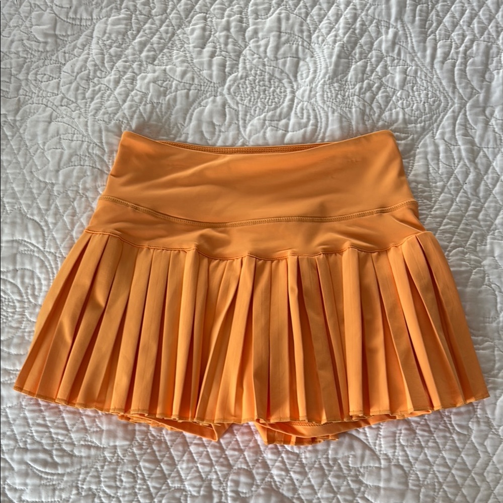 Pleated Orange Mini Skirt